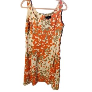 Ronni Nicole orange cream polka dots size 10